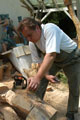 Click to see it big Ich mit Kettensäge, Impression aus dem Atelier